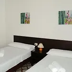 Отель Flores Адехе